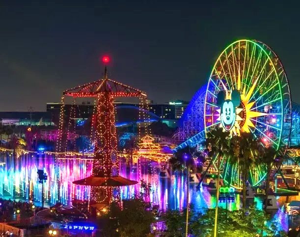 Ferris wheel lit up at night near Disneyland Anaheim